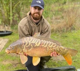 James with a carp caught at Alderwood Fishery