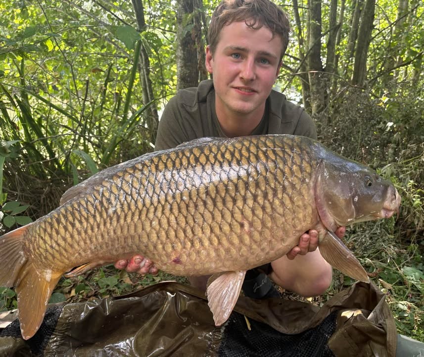 Daniel with a carp caught at Alderwood Fishery