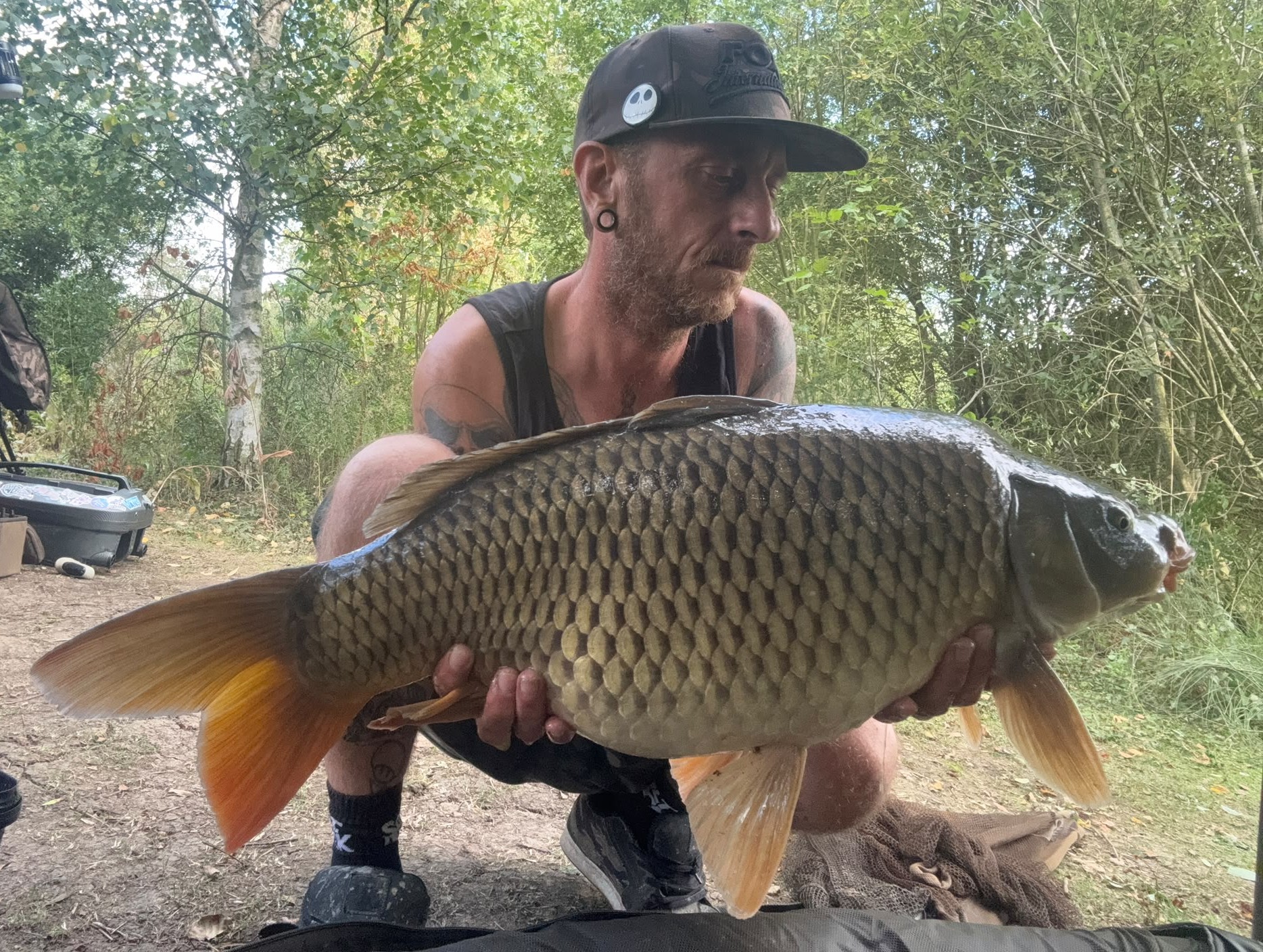 Jason with a carp caught at Alderwood Fishery