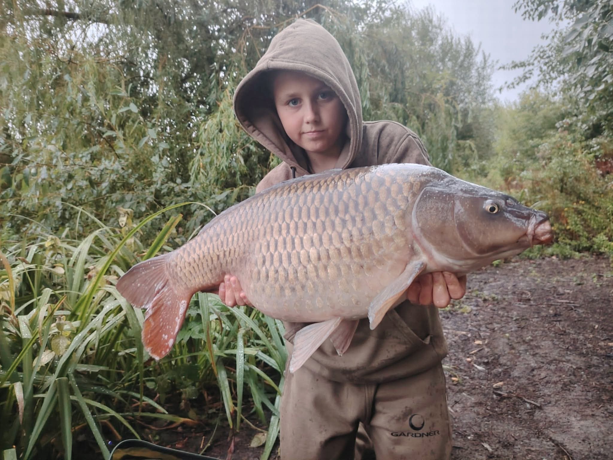 Josh with a carp caught at Alderwood Fishery