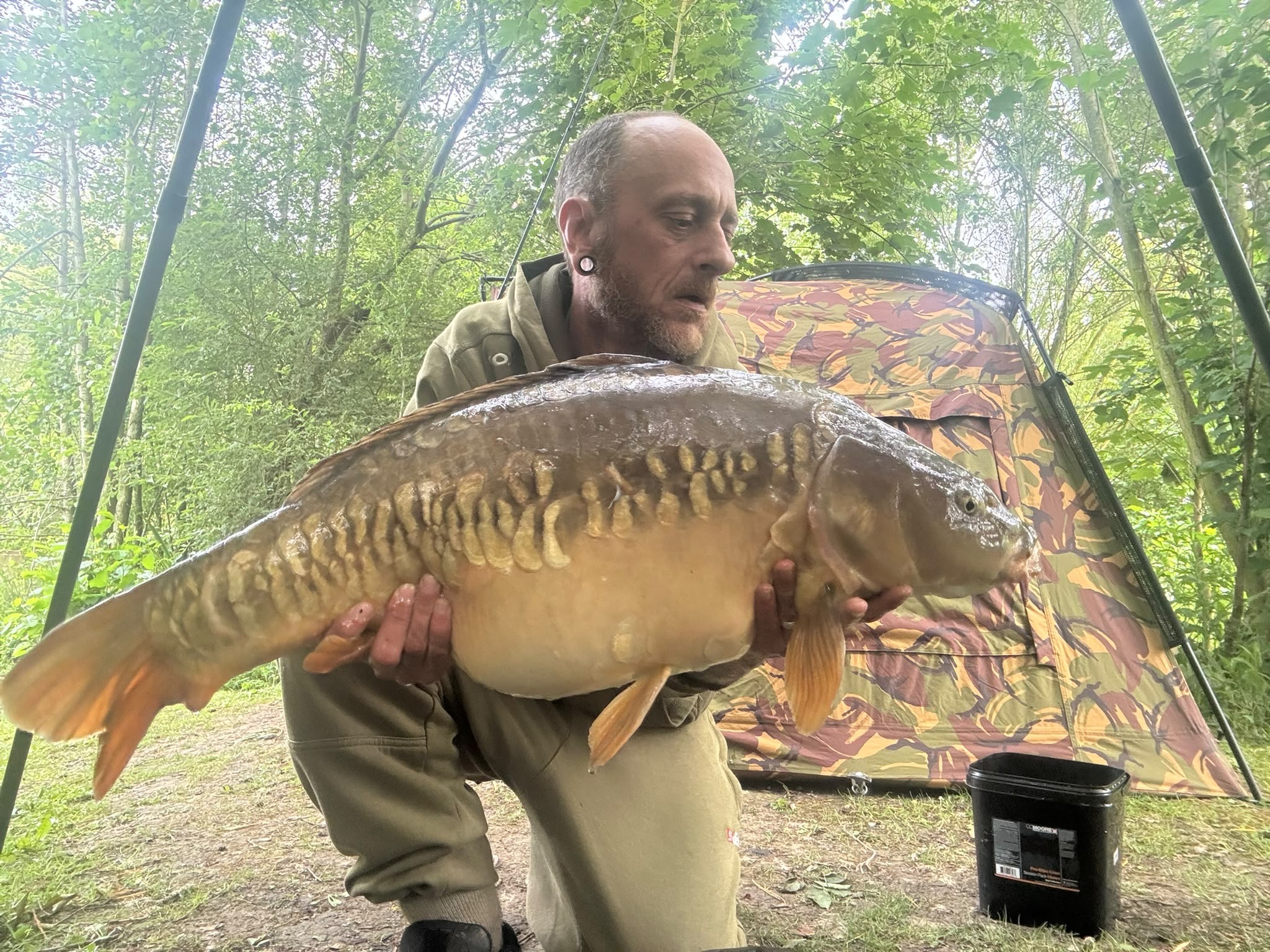 Jason with a carp caught at Alderwood Fishery
