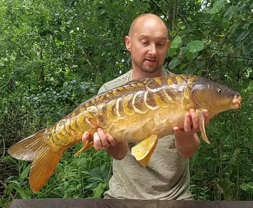 Paul with a carp caught at Alderwood Fishery